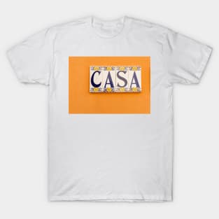 Village street in old Spanish town with Spanish word CASA in tiles on orange wall T-Shirt